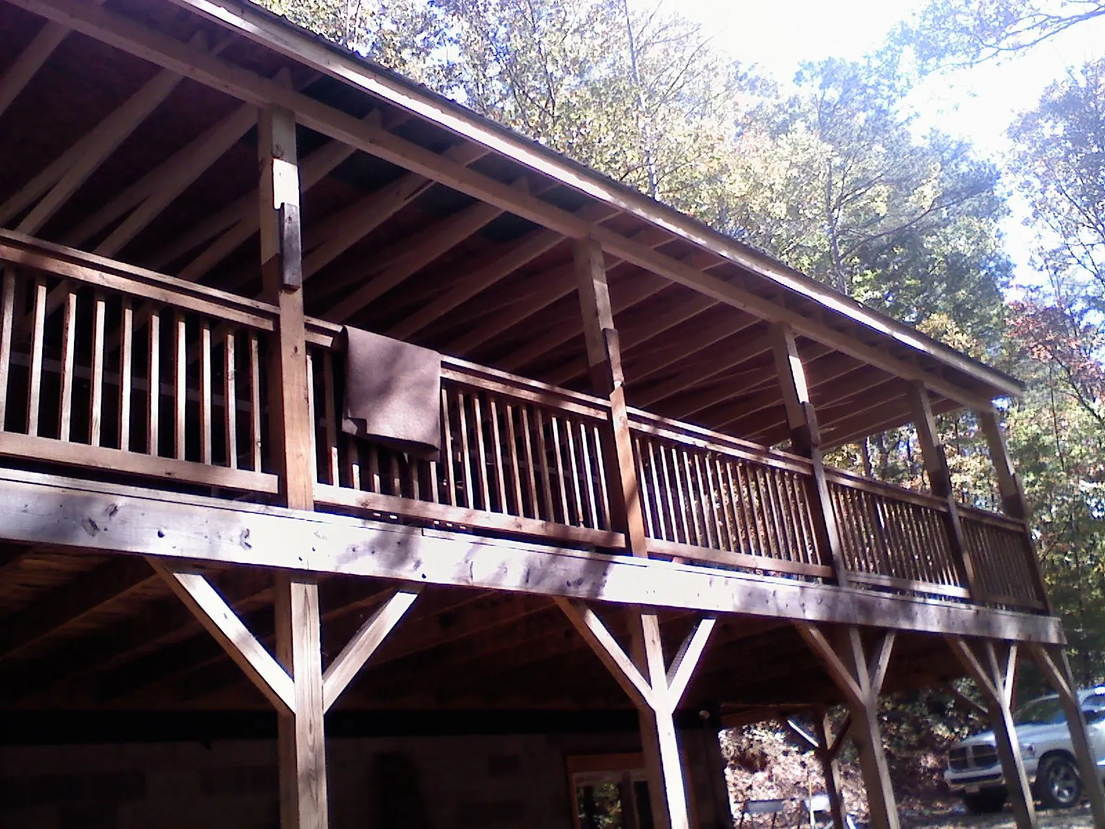 Timber framing under a new elevated porch and deck — Roof Leak Repair in Frenchville by Roofing Brothers